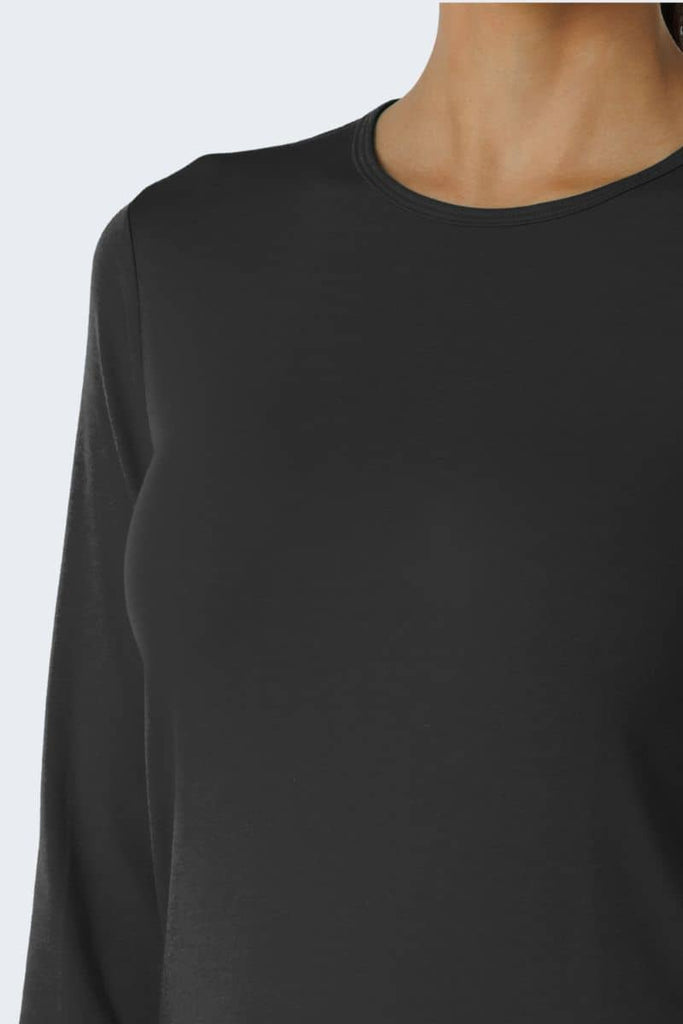 Black long-sleeve shirt worn by a person on a light gray background. Wink 2189 Style shirt