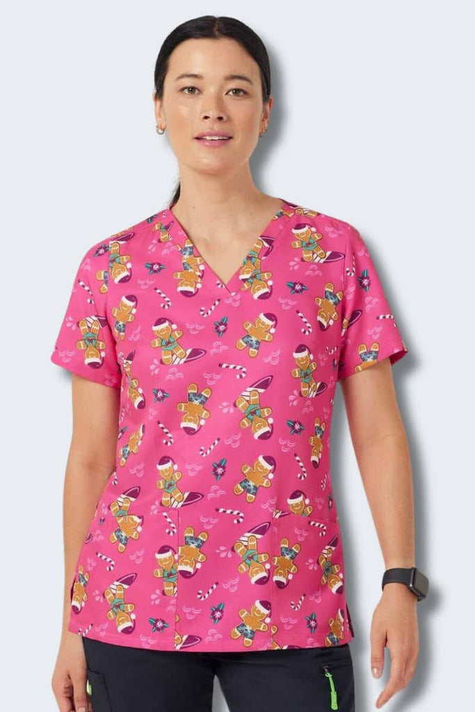 CATUXV Gingerbread Surfer Pink Women's Christmas Scrub Top,Infectious Clothing Company