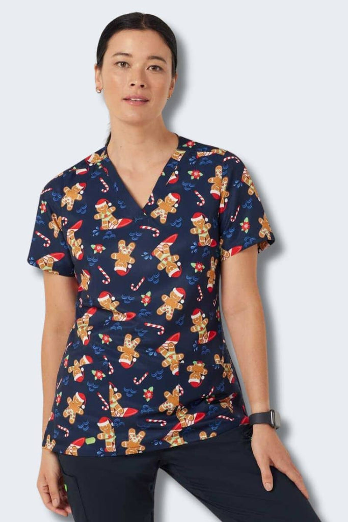 CATUXV Gingerbread Surfer Navy Women's Christmas Scrub Top,Infectious Clothing Company