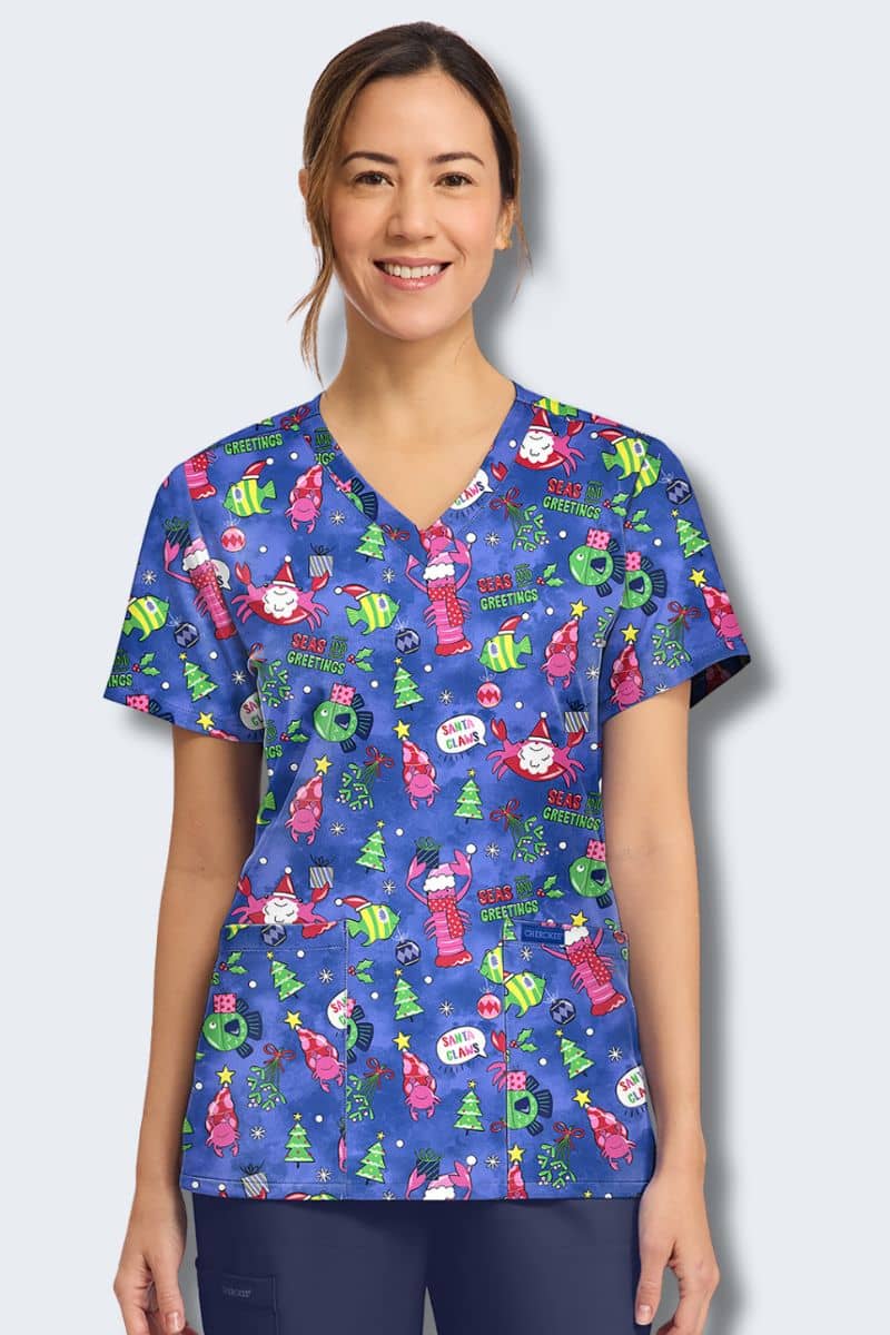 Cherokee CK856 Santa Claws print scrub top, front view – Santa crab, festive fish and scarf-wearing lobster on deep blue background, Infectious Clothing Company