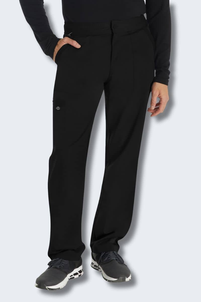 Person wearing black pants and black top on a white background. Dickies DK220