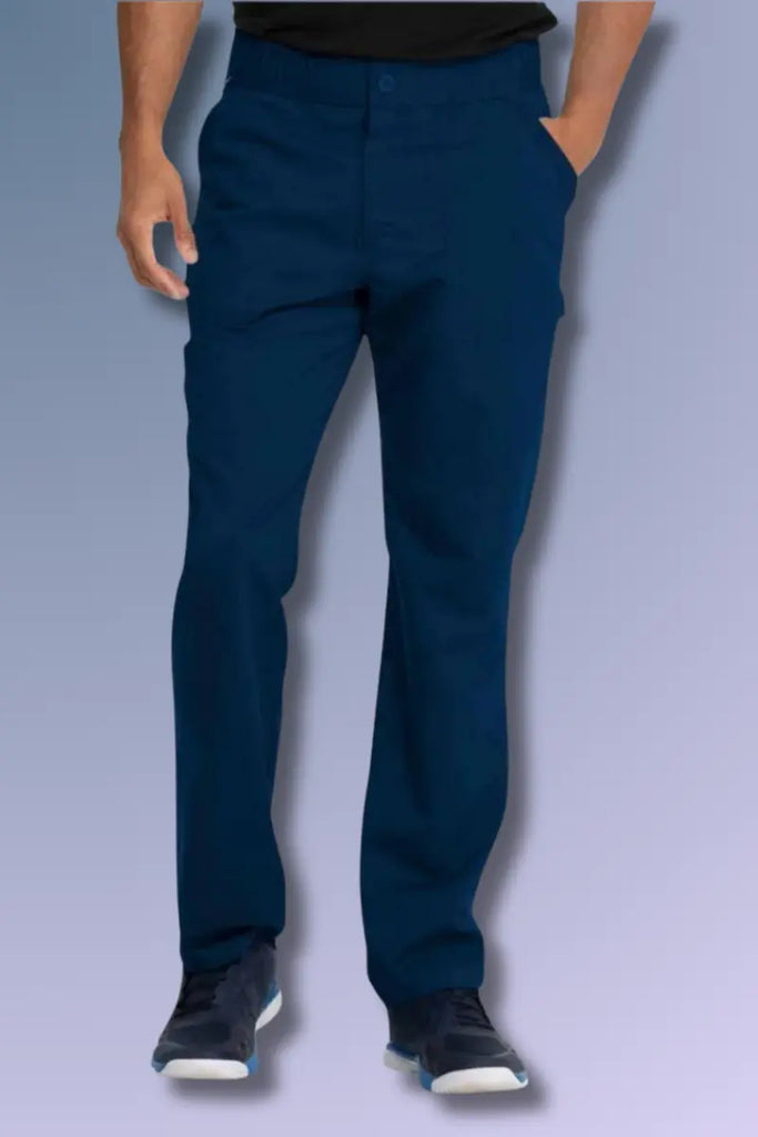 Navy blue pants worn by a person on a light gray background - Dickies DK220_Navy_ Scrub Pants