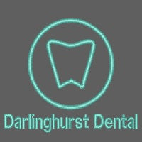 Darlinghurst Dental logo with a tooth icon on a dark background