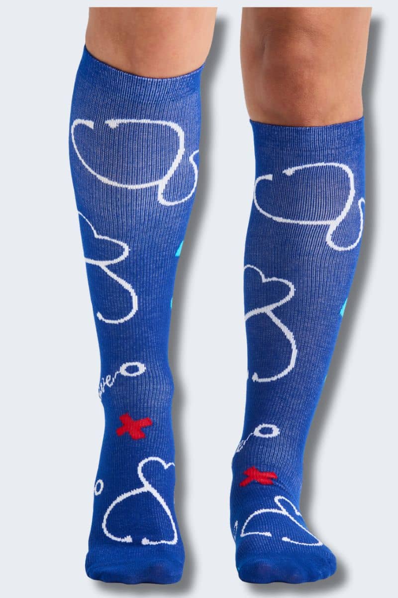 Blue knee-high socks with white elephant designs on a light gray background. Cherokee printsupport - healing thoughts