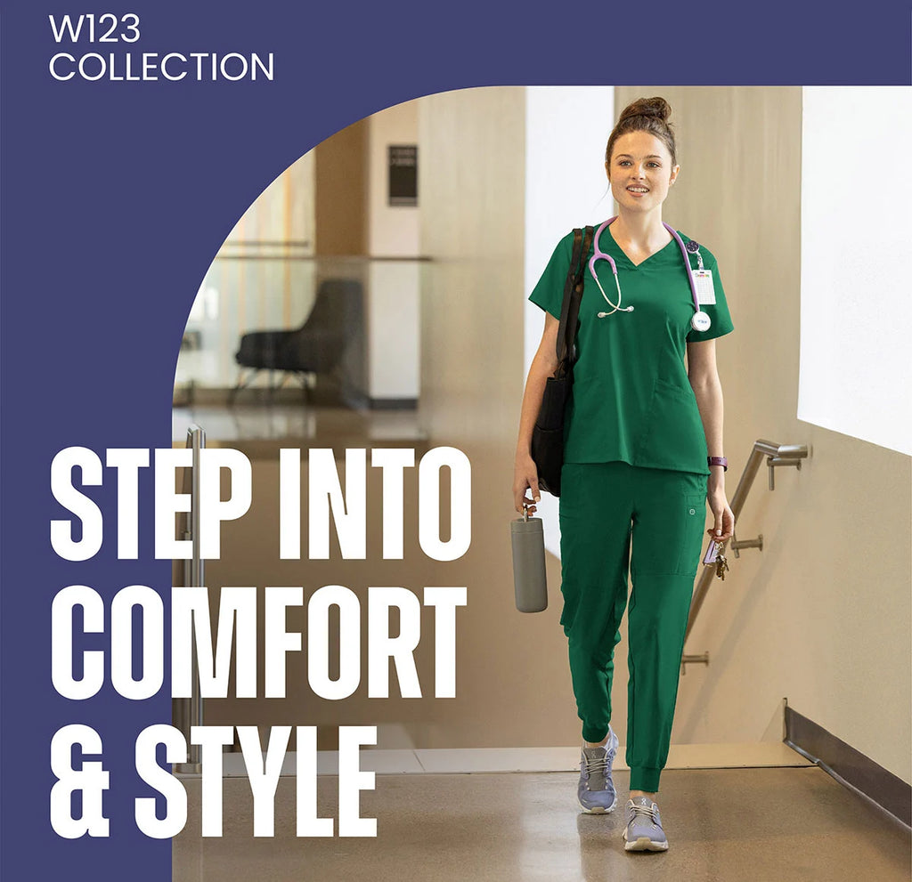 Person in green scrubs walking down a hallway with promotional text for W123 Collection. Wink Scrubs Australia