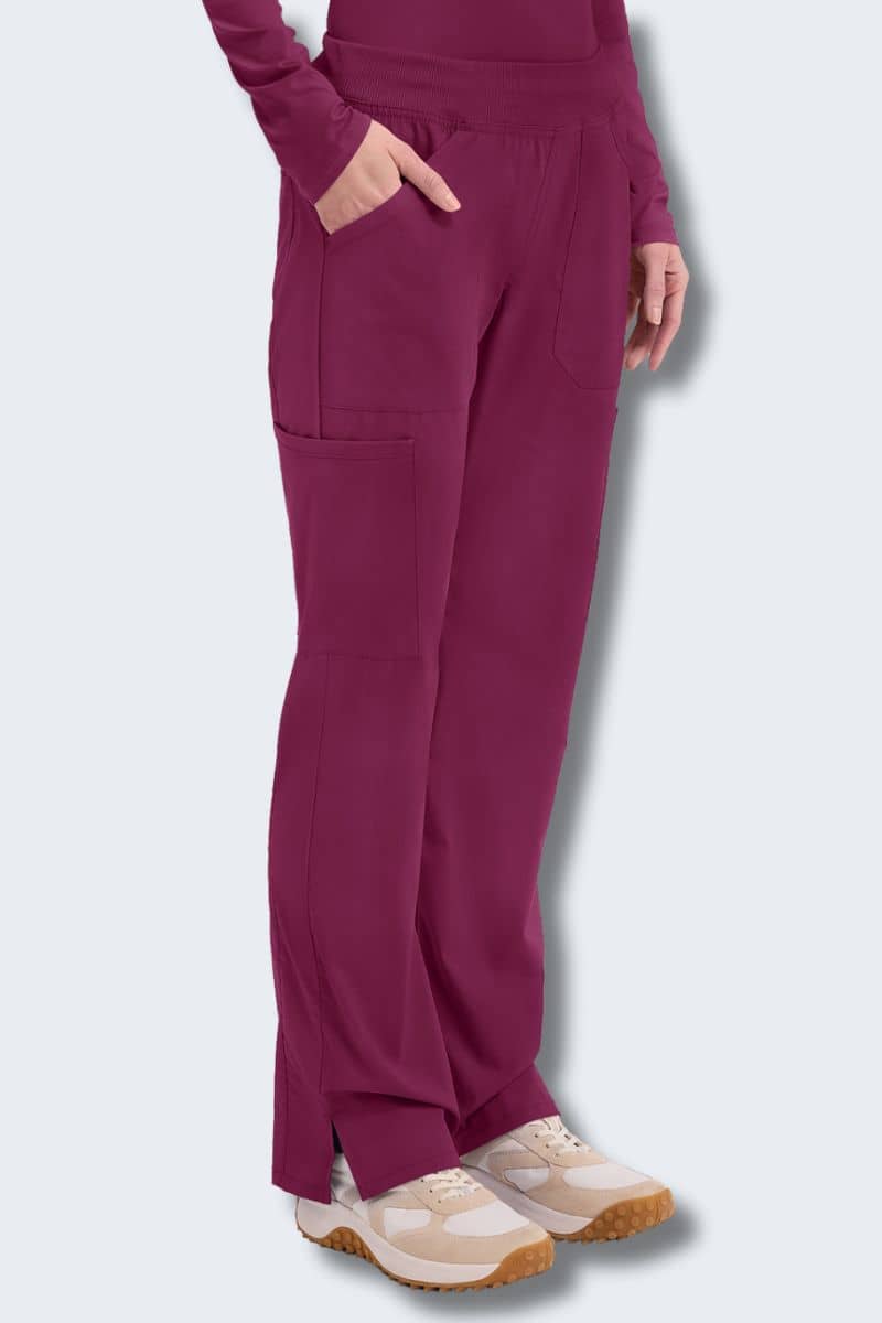 Purple pants worn by a person on a light gray background. Cherokee WW170 Women's Scrub Pants Wine